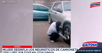 Mujer-desinfla-neumaticos-camioneta-Peru-Libre-mal-estacionada