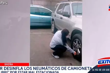 Mujer-desinfla-neumaticos-camioneta-Peru-Libre-mal-estacionada