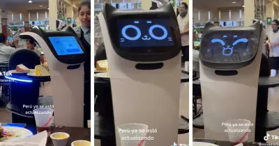 Joven graba a robot en restaurante de Lima.