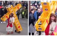 Hombre genera polémica tras recrear Vía Crucis cargando cruz hecha con cajas de cerveza