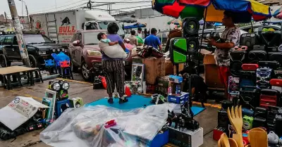 comerciantes se preparan ante fuertes lluvias
