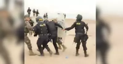 Polica herido tras enfrentamientos contra migrantes.