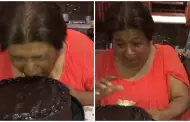 Mujer muerde su pastel de cumpleaos, pero su dentadura se suelta y se queda en el postre