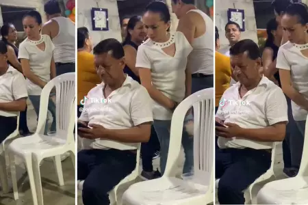 Mujer aprovecha que su esposo está distraído y aprovecha en revisar su celular.
