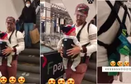 Hombre captado con doble canguro para llevar a su hijo y la mascota: "Doblemente luchn"