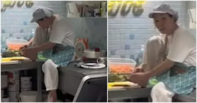 Chef se corta las uas en cocina de restaurante vegano