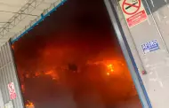 SJL: Ms de 20 unidades de bomberos atienden incendio que consume almacn de telas
