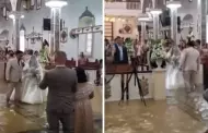 Nada los detuvo! Novios se casan en iglesia inundada durante un tifn