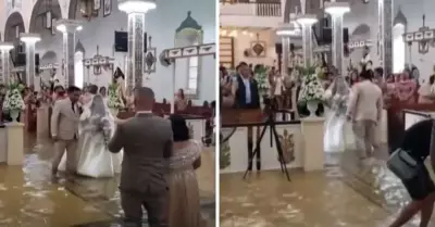 Novios deciden casarse con iglesia inundada en Filipinas.