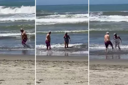Abuelitos juegan en la playa y escena cautiva en redes sociales.