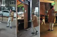 "Solo una copa y nos vamos": Perrito jala a su dueño hasta un bar durante su paseo