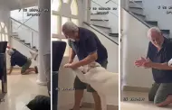 "El engredo de casa": Abuelito finge ser un perrito y le ensea a su mascota cmo abrir la puerta
