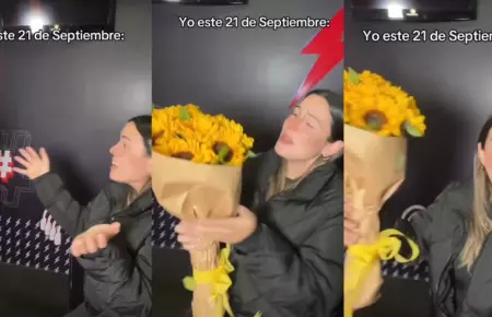 Mujer se autorregala flores amarillas.