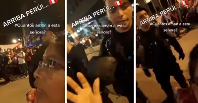 Peruana 'trolea' EN VIVO a un polica chileno durante el 'banderazo'.