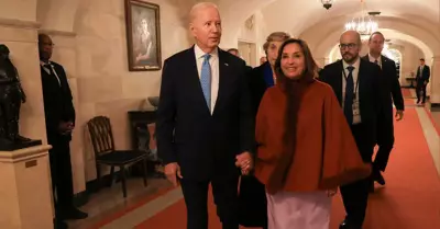 Dina Boluarte y Joe Biden.