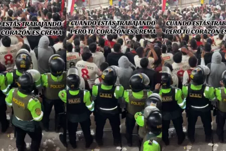 Polica alienta a su equipo en estadio.