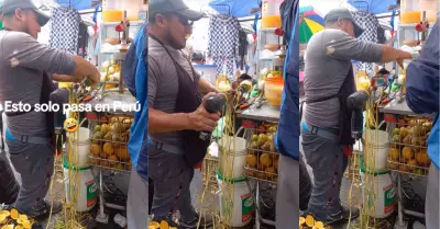 Comerciante hace funcionar su peladora de naranjas con un taladro.