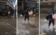 Joven carga a su enamorada y cruza pista inundada por lluvia en Huancayo: "Todo un caballero!"