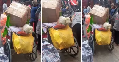 Abuelita en silla de ruedas es usada como carga.