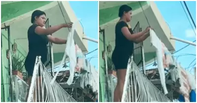 Mujer usa cable de poste para tender su ropa