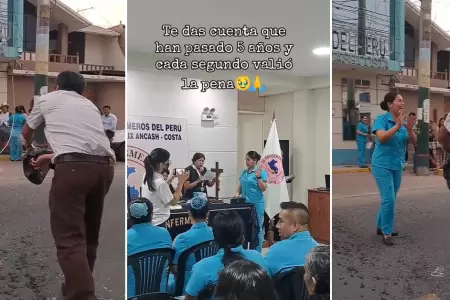 Padre baa con champn a su hija licenciada como enfermera.