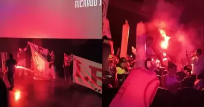 Hinchas de Universitario prenden bengala en sala de cine