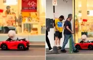 Se rob las miradas! Perrito enternece las redes al 'manejar' un carro rojo en Lima: "El consentido de casa"