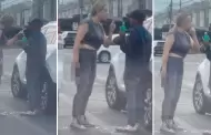 Mujer amenaza con una pistola a limpiaparabrisas en un semforo: "No quiere su servicio" (VIDEO)