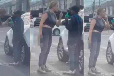 Mujer amenaza con arma a limpiaparabrisas.
