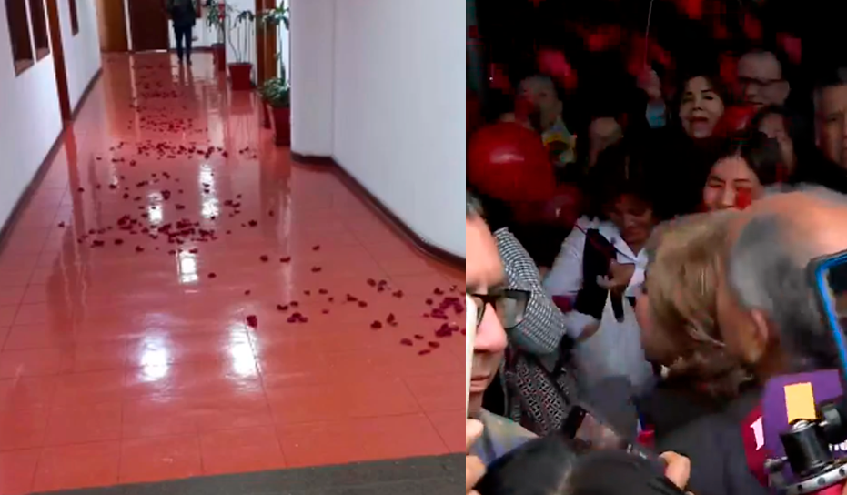 Trabajadores y funcionarios de la Fiscala reciben a Zoraida valos con ptalos de rosas.