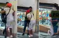 Inslito! Mujer golpea a un hombre mientras l le suplica en plena calle: "Pgame, pero no me dejes"
