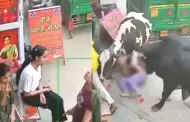 Inslito! Vacas embisten brutalmente a dos jvenes en plena calle: Ataque captado en video