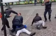 De terror! Hombre enloquece y ataca con arma blanca a ciudadanos y policas en una plaza (VIDEO)