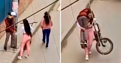 Mujer lleva sobre el hombro a su novio borracho.