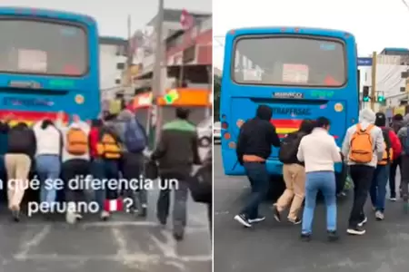 Pasajeros se unen y empujan bus averiado.