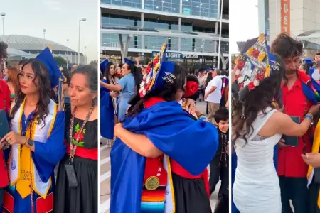 Joven llora agradecida con sus padres en graduacin.