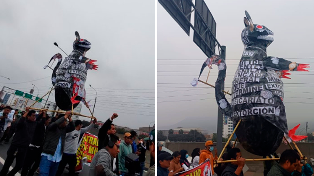 Transportistas marchan al Congreso con rata gigante en hombros cansados de las extorsiones.