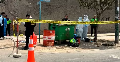 Hallan restos calcinados en contenedor de basura en Huachipa.