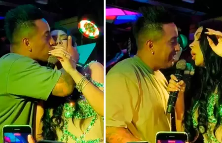 Christian Cueva le roba beso a Pamela Franco en pleno show.