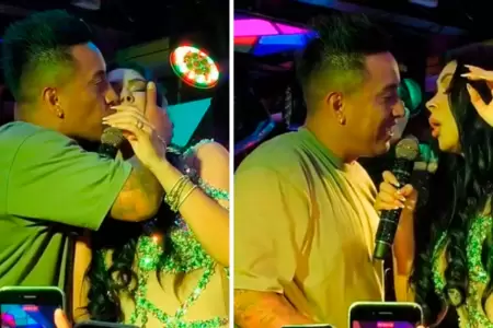 Christian Cueva le roba beso a Pamela Franco en pleno show.