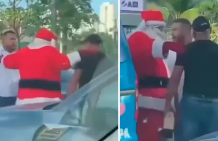 Santa Claus detiene una pelea entre dos hombres.