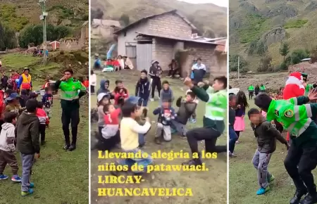 Polica baila huaylas con nios en chocolatada navidea.