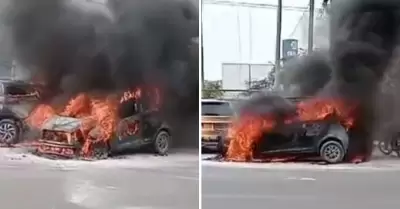 Taxi se incendia tras sufrir presunto cortocircuito.