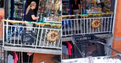 Mujer abri tienda en el balcn de su departamento.