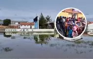 Puno: Nios inician el ao escolar en la calle ante inundacin de sus aulas