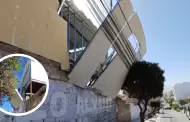 Colegio en construccin COLAPSA por fuertes vientos en Arequipa: Cables y rbol sostienen pared