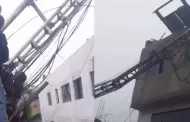 SJL: Trabajador se salva de morir luego del colapso de una antena de telefona sobre una vivienda