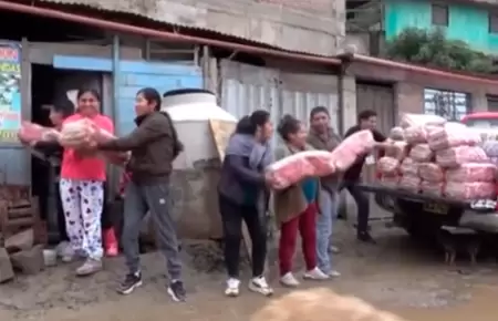 Exitosa y Taiwn llevan alimentos a olla comn en VMT.