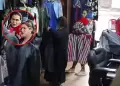 Banda de 'tenderos' es captada robando ropa en un local de Barranca utilizando a un beb de distraccin