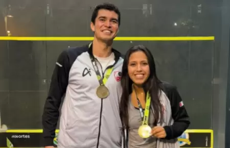 Diego Elas y Luciana Castillo con la medalla de oro.